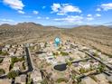 Aerial view of a house in a desert community at 2122 W Red Range Way, Phoenix, AZ 85085
