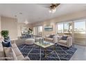 Bright living room features modern furniture and access to a balcony at 3600 N 5Th Ave # 304, Phoenix, AZ 85013