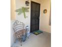 Inviting front entry with decorative accents and welcome mat at 9707 E Mountain View Rd # 2405, Scottsdale, AZ 85258