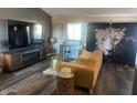 Spacious living room with stylish furniture and fireplace at 9707 E Mountain View Rd # 2405, Scottsdale, AZ 85258