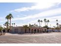 Tan colored house with arched entryway and attached garage at 10801 N 45Th St, Phoenix, AZ 85028
