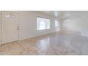 Bright living room with tile floors and an entryway at 10801 N 45Th St, Phoenix, AZ 85028