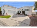 White two-story home with a three-car garage at 11549 E Bella Vista Dr, Scottsdale, AZ 85259