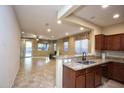 Kitchen features granite countertops and stainless steel appliances at 26053 W Tonopah Dr, Buckeye, AZ 85396
