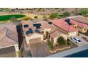 Single-story home with solar panels and attached garage at 26822 W Oraibi Dr, Buckeye, AZ 85396