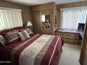 Bright bedroom with double bed and ample closet space at 4065 E University Dr # 140, Mesa, AZ 85205