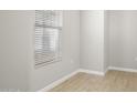 Simple bedroom with tile flooring and window blinds at 5021 E Anderson Dr, Scottsdale, AZ 85254