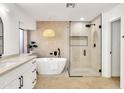 Elegant bathroom with freestanding tub and walk-in shower at 1237 E Mineral Rd, Gilbert, AZ 85234