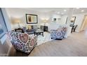 Living room features modern furniture and hardwood floors at 2064 S Farnsworth Dr # 18, Mesa, AZ 85209