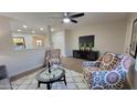 Living room with flat-screen TV and comfortable armchairs at 2064 S Farnsworth Dr # 18, Mesa, AZ 85209