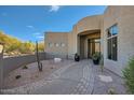 Landscaped walkway leading to the front entrance of a beautiful home at 8300 E Dixileta Dr # 281, Scottsdale, AZ 85266