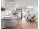 Bright dining area adjacent to the kitchen, perfect for everyday meals at 205 S Higley Rd # 32, Mesa, AZ 85206