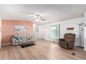 Relaxing living room with comfy seating and ceiling fan at 205 S Higley Rd # 32, Mesa, AZ 85206