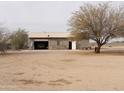 Detached garage with single door and large overhead door at 30138 W Roosevelt St, Buckeye, AZ 85396