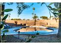 Inviting kidney shaped pool in backyard oasis at 10601 N 26Th Pl, Phoenix, AZ 85028