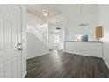 Bright living room with high ceilings, loft, and laminate floors at 19601 N 7Th St # 2026, Phoenix, AZ 85024