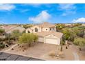 Two-story home with a two-car garage and desert landscaping at 7150 E Morning Vista Ln, Scottsdale, AZ 85266