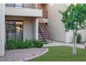 Condo exterior showing stairs and landscaping at 9340 N 92Nd St # 118, Scottsdale, AZ 85258