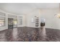 Bright living room with tile floors and view to kitchen at 12838 S 40Th Pl, Phoenix, AZ 85044