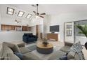 Open living room with vaulted ceiling, and view of kitchen at 12838 S 40Th Pl, Phoenix, AZ 85044