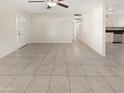 Bright living room with tile flooring and open floor plan at 1013 W Angela Dr, Phoenix, AZ 85023