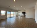 Open living space with tile floors and sliding glass doors at 22948 E Twin Acres Dr, Queen Creek, AZ 85142