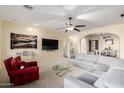 Spacious living room with comfortable seating and large windows at 2512 W Corral Rd, Phoenix, AZ 85041