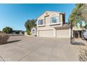 Two-story house with a two-car garage and a basketball hoop at 2832 E Laurel St, Mesa, AZ 85213