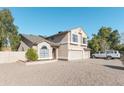 Two-story house with a two-car garage and a basketball hoop at 2832 E Laurel St, Mesa, AZ 85213