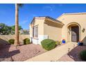 Front entrance with decorative door and walkway at 13414 W Micheltorena Dr, Sun City West, AZ 85375