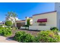 Spanish style home with a brick driveway and mature landscaping at 6317 E Pinchot Ave, Scottsdale, AZ 85251