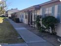 Well-maintained exterior with landscaping and walkway at 849 N Revere St # B, Mesa, AZ 85201