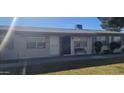 Condo building exterior with a walkway and bench at 849 N Revere St # B, Mesa, AZ 85201