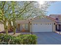 Charming single-story home with a well-maintained front yard at 4047 E Rowel Rd, Phoenix, AZ 85050