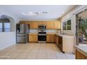 Well-equipped kitchen with ample cabinetry and modern appliances at 4047 E Rowel Rd, Phoenix, AZ 85050
