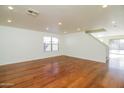 Spacious living area with hardwood floors and recessed lighting at 533 W Prickly Pear Dr, Casa Grande, AZ 85122