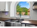 Kitchen features a farmhouse sink and a large window at 838 E Harvard Ave, Gilbert, AZ 85234