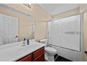Clean bathroom with a shower/tub combo and vanity at 5677 S 239Th Dr, Buckeye, AZ 85326