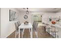 Kitchen dining area features a table and chairs at 6801 S Palm Dr, Tempe, AZ 85283