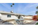 Relaxing backyard oasis with a swimming pool at 6801 S Palm Dr, Tempe, AZ 85283