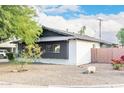 Side view of a remodeled mid-century modern home at 8601 E Roanoke Ave, Scottsdale, AZ 85257