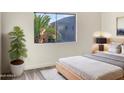 Cozy bedroom with large window and ample natural light at 10221 E Knowles Ave, Mesa, AZ 85209