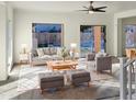 Bright living room with access to backyard and pool at 10221 E Knowles Ave, Mesa, AZ 85209