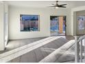 Spacious living room featuring sunlight and backyard access at 10221 E Knowles Ave, Mesa, AZ 85209