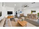 Bright living room with an open floor plan and modern decor at 39943 N Casa Del Rosa Ln, San Tan Valley, AZ 85140