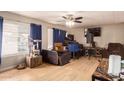 Living room with hardwood floors and a cat tree at 6828 W Pierce St # 126, Phoenix, AZ 85043