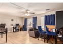 Living room with hardwood floors and home office at 6828 W Pierce St # 126, Phoenix, AZ 85043