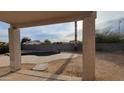 Relaxing backyard oasis featuring a kidney-shaped pool at 11351 W Hopi St, Avondale, AZ 85323