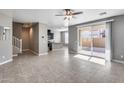 Open living space with tile floors and sliding glass doors at 1255 N Arizona Ave # 1276, Chandler, AZ 85225
