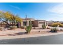 Single story home with mature trees and desert landscaping at 2443 N Trenton --, Mesa, AZ 85207